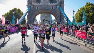 Runners leaving Tower Bridge during the London Marathon 2022