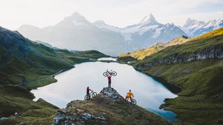Mountain bikers by Swiss lake
